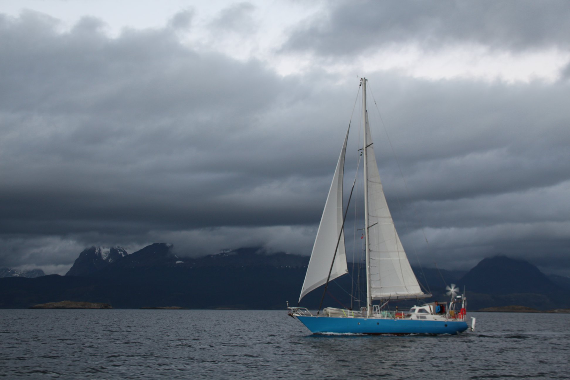 Under sail in the Beagle Channel in front of Ushuaia. Photo by Sailboat Petrouchka