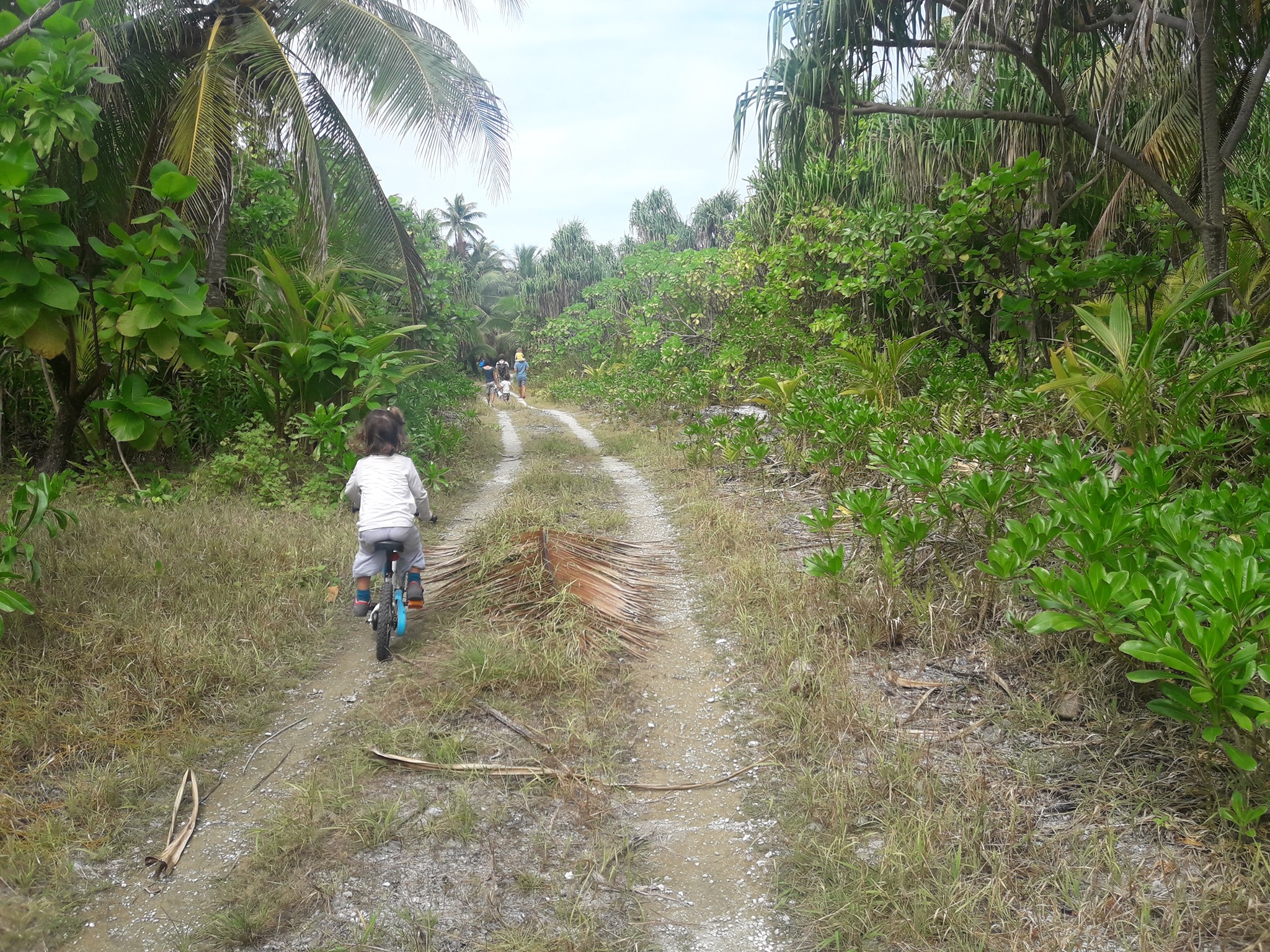 Biking on the only path in Mopelia